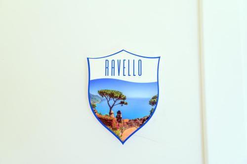 a shield with the words rarilla at Blue View Luxury Rooms in Furore