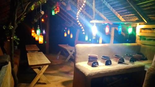 a room with a stove with lights on it at Elephant Lake Villa, Yoga & Meditation Sanctuary in Sigiriya