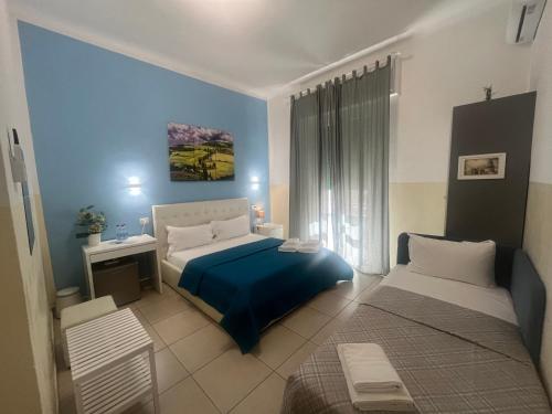 Postel nebo postele na pokoji v ubytování Hello Pisa B&B