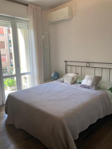 Postel nebo postele na pokoji v ubytování B&B Gardenia