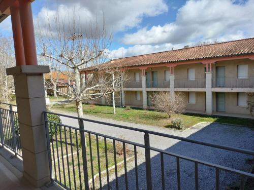 a view of a building from a balcony at Appartement entier dans résidence de tourisme in Azille