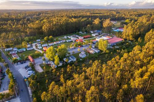 an aerial view of a school in a forest at Bungalows Land'shause in Pataias
