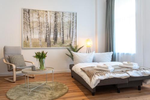 Postel nebo postele na pokoji v ubytování BENVILLE Meißen - WLAN - Smart-TV - Free Parking