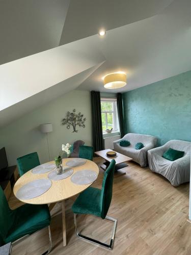 Coin salon dans l'établissement Apartmány penzion Jasmín