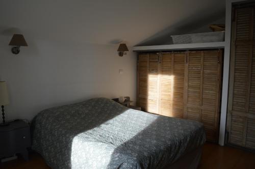 Кровать или кровати в номере Villa provençale à deux pas de Salon de Provence