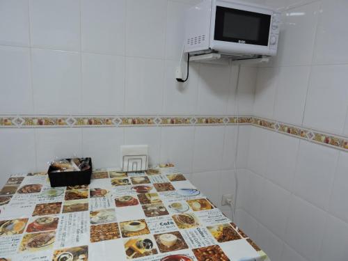 TV a/nebo společenská místnost v ubytování Apartamento San Andres