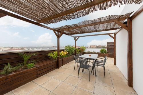 Le Surf : Triplex (T4) parking, rooftop et clim