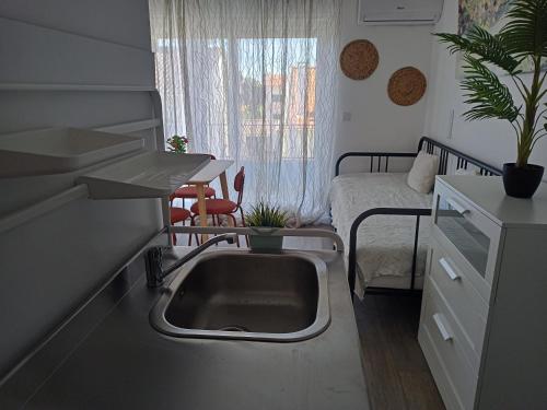 Η κουζίνα ή μικρή κουζίνα στο Mata Beach Caparica