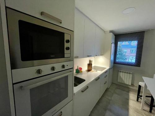 A kitchen or kitchenette at Apartamento Entero 2 HABITACIONES