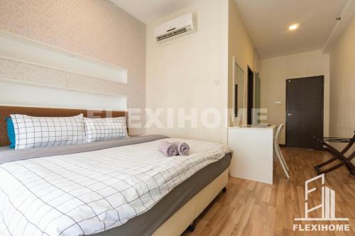 a bedroom with a bed and a desk at 9am-5pm, SAME DAY CHECK IN AND CHECK OUT, Work From Home, Shaftsbury-Cyberjaya, Comfy Home by Flexihome-MY in Cyberjaya