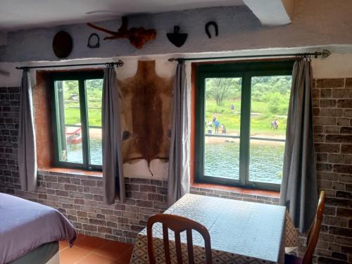 Katil atau katil-katil dalam bilik di Holiday home