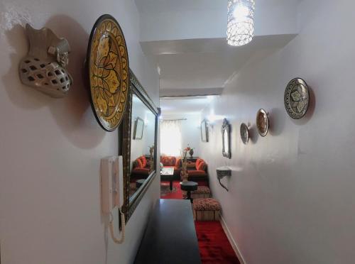 a hallway of a house with a room with at Cosy apartement close to the AIRPORT in Tangier