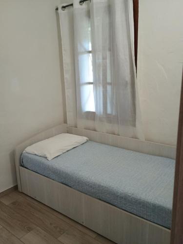 Posteľ alebo postele v izbe v ubytovaní Villetta Bouganville