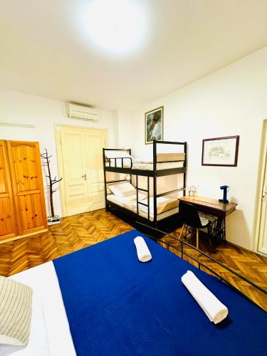 Postel nebo postele na pokoji v ubytování HOSTEL ART & JOY