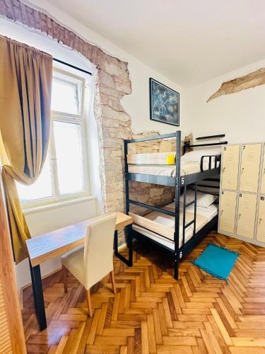 Postel nebo postele na pokoji v ubytování HOSTEL ART & JOY