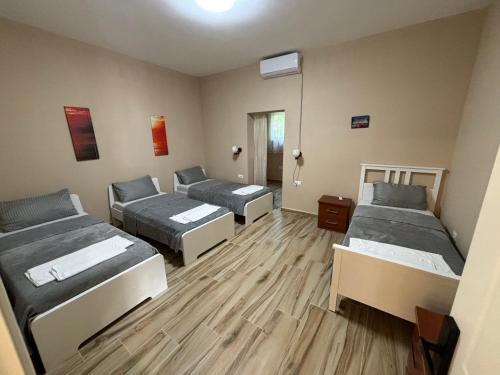 Cama o camas de una habitación en Hanna & Solei Hotel