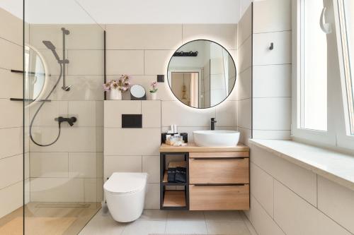 a bathroom with a toilet and a sink and a shower at Apartment Mama Marija in Hvar