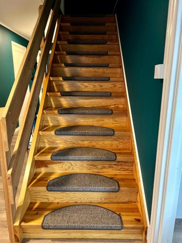 a stairway with wooden treads in a house at Magnar in Etnesjøen