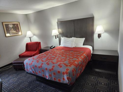Ένα ή περισσότερα κρεβάτια σε δωμάτιο στο Twin Cities Inn, Mounds View