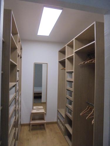 a walk in closet with a skylight at Maison de tourisme Conleau in Vannes