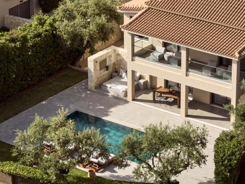 an aerial view of a house with a swimming pool at Cielo Luxury Villas in Zakynthos Town