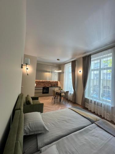 Postel nebo postele na pokoji v ubytování Old Memel Apartment