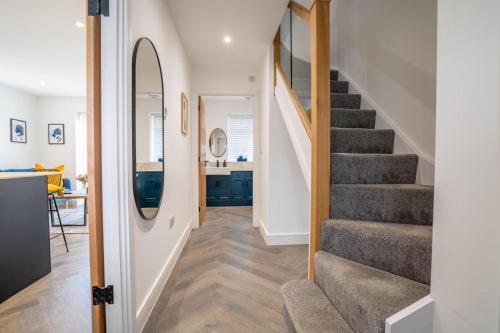 a staircase in a home with a stair case at North Horsham House in Horsham