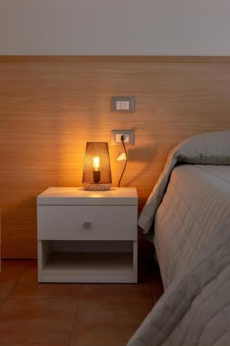 Katil atau katil-katil dalam bilik di Vistaverde Harmony Apartments