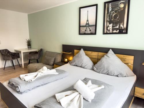 Postel nebo postele na pokoji v ubytování Apartment für 3 Gäste mit kostenlosen Parkplätzen und Lift