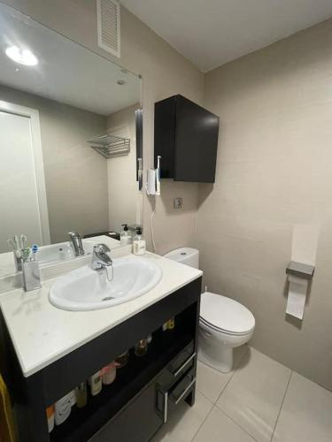 Ένα μπάνιο στο Apartamento en playa Torreón