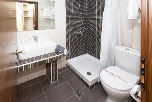 Ένα μπάνιο στο Le Monde SeaView Suites