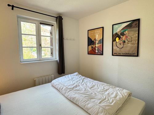 Ένα ή περισσότερα κρεβάτια σε δωμάτιο στο Duplex & terrasse panoramique. Parking. Piscine été