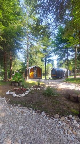 a cabin in the middle of a forest with trees at Tumba Sisli Vadi in Kartepe