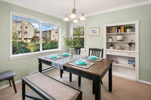 a dining room with a table and two chairs at Hidden Getaway Family House - UW - Children Hospital in Seattle