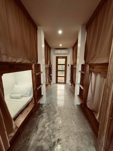 Кровать или кровати в номере Casavia Siargao