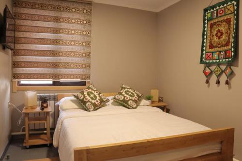 Katil atau katil-katil dalam bilik di Salamat Hotel