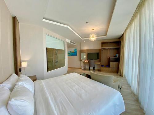 Postel nebo postele na pokoji v ubytování Panorama Nha Trang With free Gym and Pool