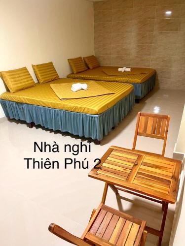 Voodi või voodid majutusasutuse Nhà Nghỉ Thiên Phú 2 toas