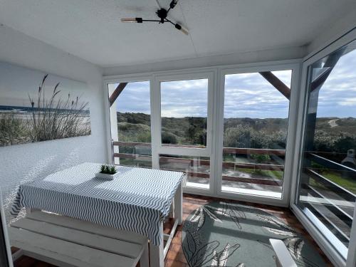 Μπαλκόνι ή βεράντα στο Panorama d'EXCEPTION sur Domaine Naturel Protégé et la Mer proche centre La Crête des Dunes Maison complète ou APT uniquement