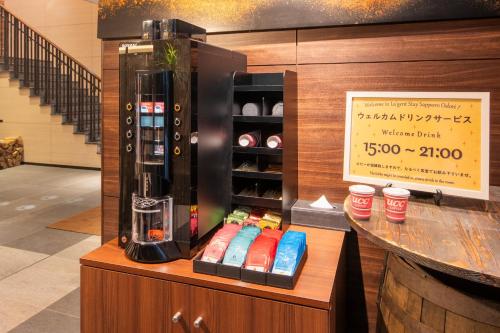 a drink dispenser in aasteryasteryasteryasteryasteryasteryasteryasteryasteryastery at La'gent Stay Sapporo Odori Hokkaido in Sapporo