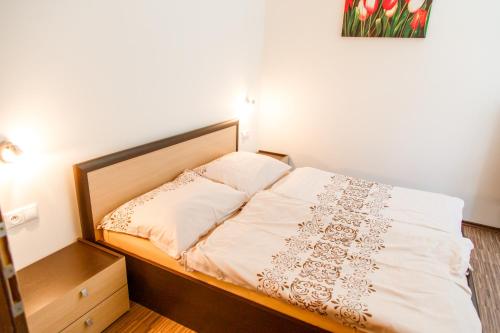 Кровать или кровати в номере Apartmán Tále č.309