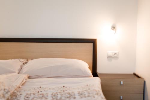 Ένα ή περισσότερα κρεβάτια σε δωμάτιο στο Apartmán Tále č.309