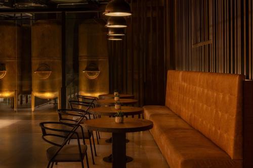 a row of tables and chairs in a restaurant at Marriott Marquis Dubai Creek in Dubai