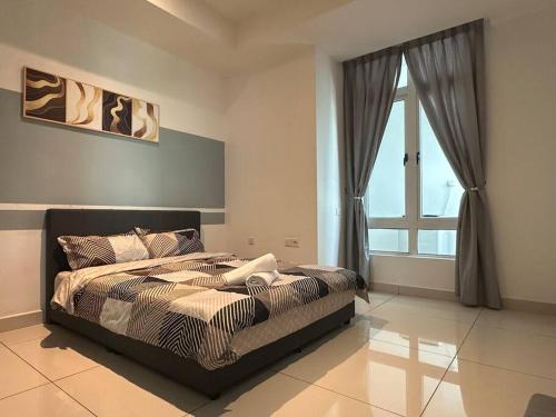 Un ou plusieurs lits dans un hébergement de l'établissement KSL City Mall 6pax with 55” TV & Netflix@2CarPark