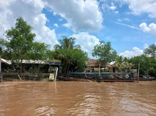 a view of a flooded street with water at BenTrestay in Giồng Tú Ðiền