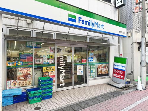 a store front of a store with signs on it at 吉屋 in Tokyo