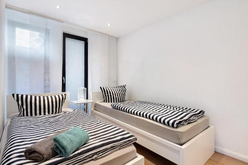 A bed or beds in a room at Casa Caso - Apartment 1