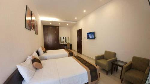 TV a/nebo společenská místnost v ubytování Ngoc Linh Luxury Hotel