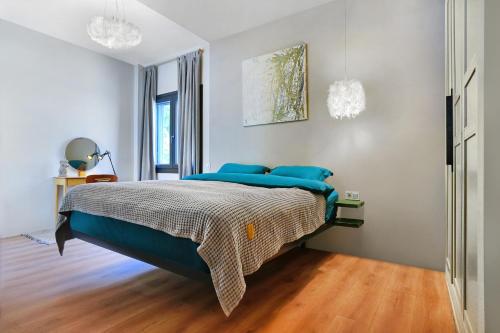 Posteľ alebo postele v izbe v ubytovaní P Faliro Riviera Suite