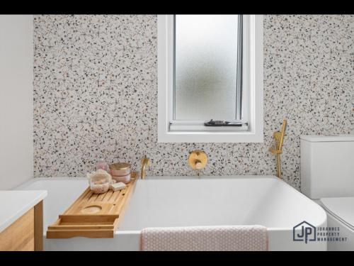 Φωτογραφία από το άλμπουμ του Elegant Beachside Retreat with Luxurious Amenities σε Tomakin